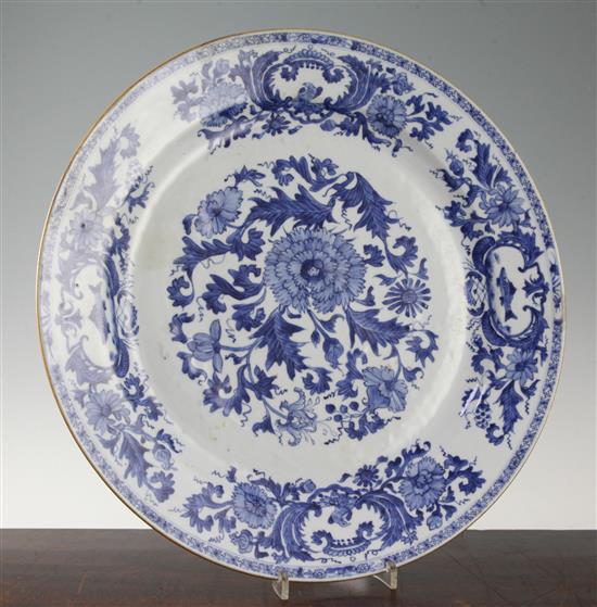 A Chinese export blue and white circular dish, Kangxi / Yongzheng period, 41cm, restorations